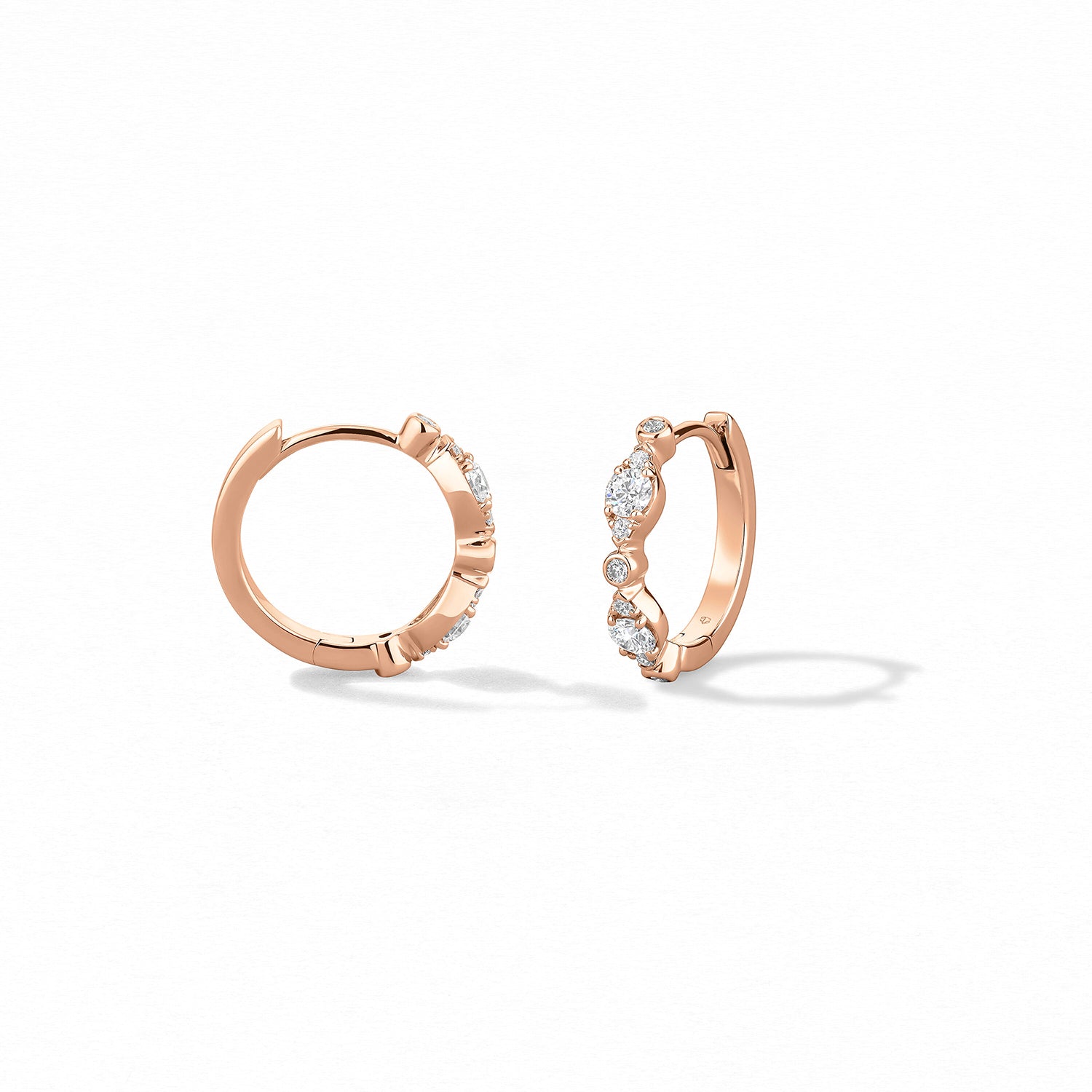 Video Thumbnail: Hearts on Fire Rose Gold Bezel Regal Huggie Style Earrings Diamonds 0 36 Carat Total Weight Vs Si Clarity G H Colour - Hof 18kr Gold Bezel Regal Huggie Earrings