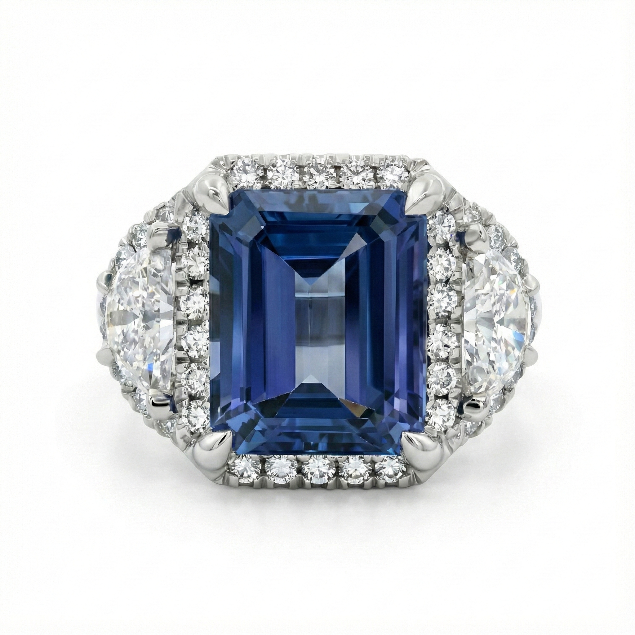 Platinum Tanzanite and Diamond Accented Three-Stone Ring