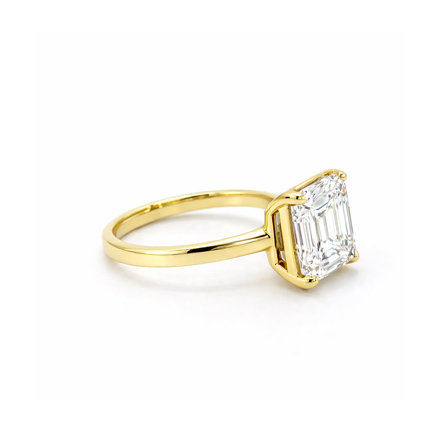 Video Thumbnail: The Bezel Set Engagement Ring Features a Light Amount of Metal Encompassing the Center Stone and Accentuating a 6 01 Carat Total Weight Emerald Diamond Clarity L Colour Cast in 18 8669 - Norman Silverman 18k Yellow Gold Bezel-set Engagement Ring 6.01ctw