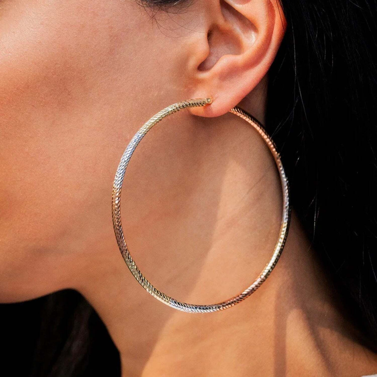 Video Thumbnail: Untitleddesign 2024 05 - 14k Tri-gold Extra Large Hoop Earrings