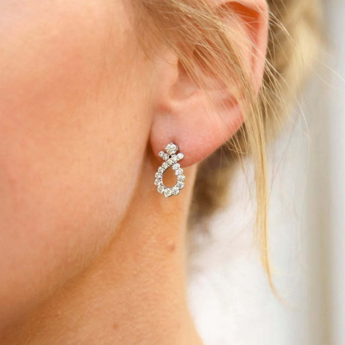 Video Thumbnail: Untitleddesign 2024 06 - Hearts on Fire Aerial Regal Scroll Diamond Drop Earrings