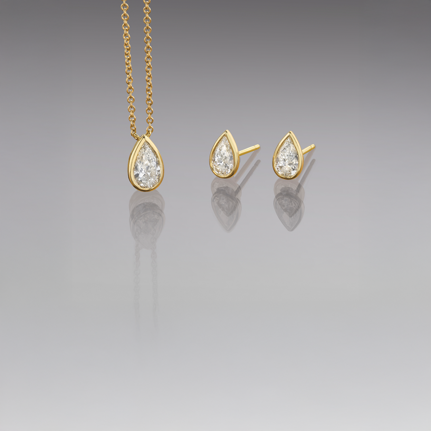 18K Yellow Gold Pear Diamond Bezel Set Studs