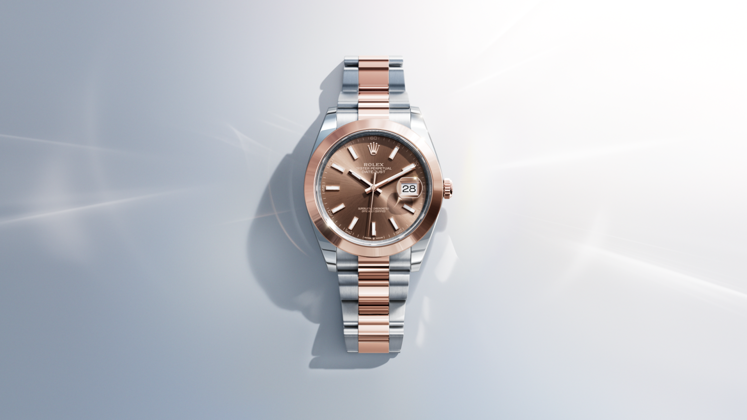 Rolex Datejust is Everose Rolesor against an abstract white background