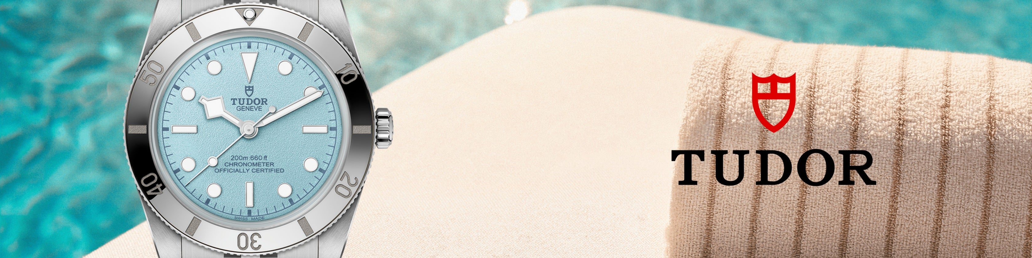 The Tudor Black Bay 54, featuring a sand-textured, lagoon blue dial, pictured poolside in the summertime