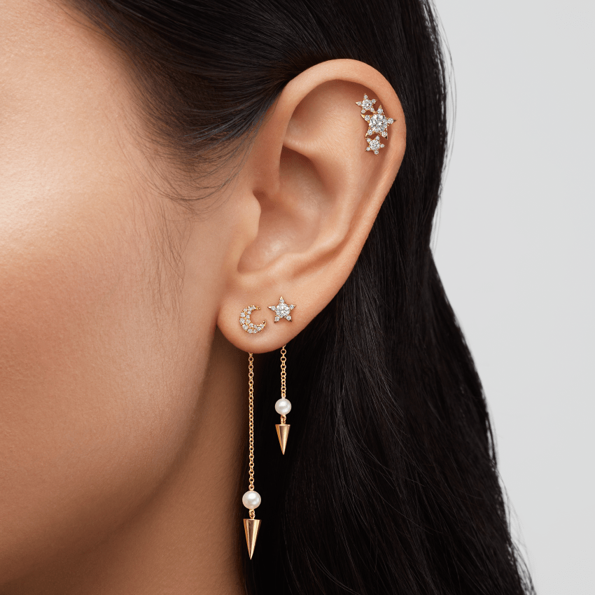 Video Thumbnail: Five Diamonds Orbit Around a Larger Center Diamond in This Solid Gold Star Includes a Traditional Butterfly Backing in a Matching Color and Karat Item Sold Singly - Maria Tash 18k Yellow Gold Diamond Star Stud Earring