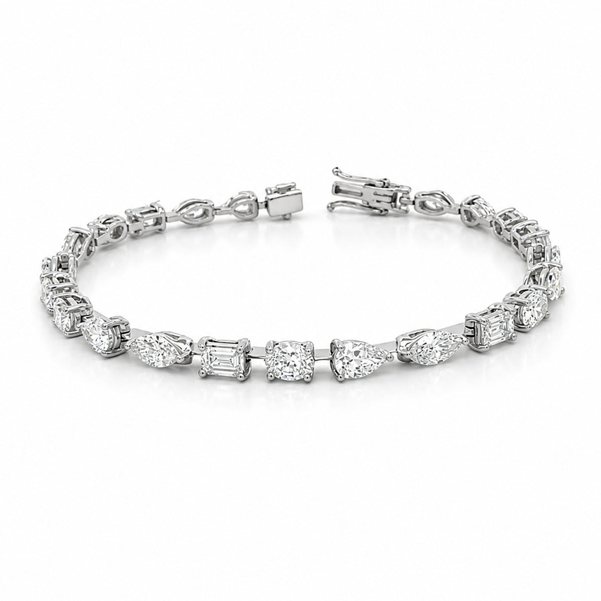 Howard 18K White Gold Alternating Shapes Diamond Illusion Set Bracelet  11.73ctw