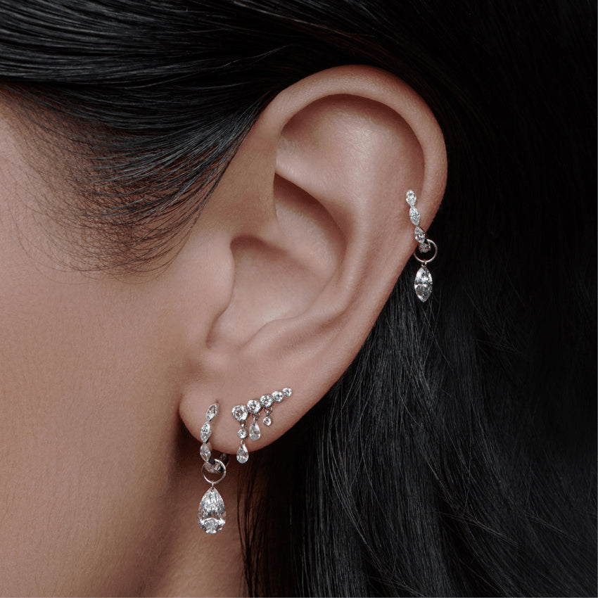Video Thumbnail: Maria Tash White Gold Invisible Set Diamond Crescendo Left Bar Stud Earring Traditional Butterfly Backing in Matching Color Item Sold Singly Solid Gold Gemstone Weight 0 - 18kw Gold 11mm Invisible Set Diamond Crescendo Left Bar Stud Earring