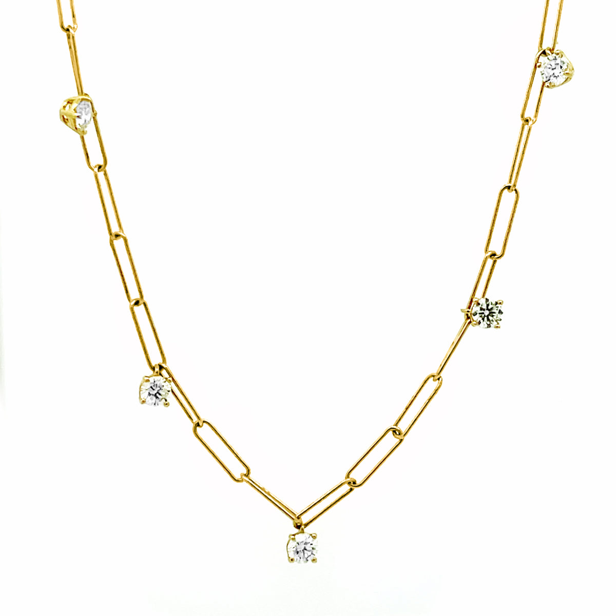 Paper Clip Necklace With  5 Station Drop Diamonds; Cast In 14K Yellow Gold. 5 Basket Set Round Brilliants 0.85 Carat Total Weight SI Clarity; G-H Colour. 3.72 Grams