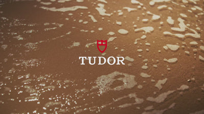 A video showcasing the Tudor Black Bay 54, featuring a sand-textured, lagoon blue dial, at the beach in summer time
